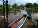 Fishing boats on the canal at a plantation village